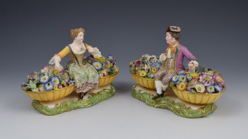 fig 1. Pair of Minton Figures Sitting Between Baskets Of Flowers Models 58