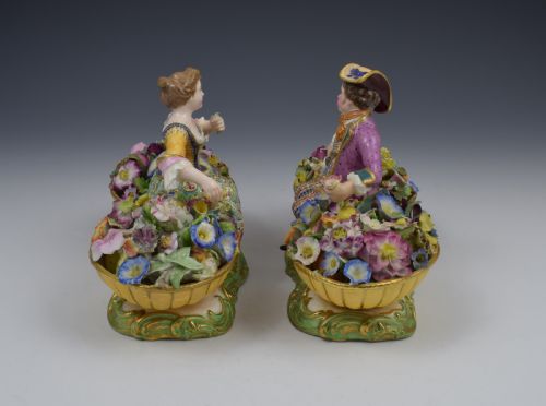fig 2. Pair of Minton Figures Sitting Between Baskets Of Flowers Models 58