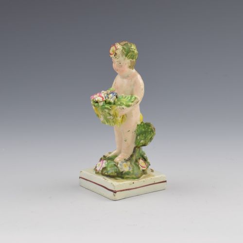 fig 1. Early Staffordshire Pearlware Figure Of A Putto With Basket c.1800
