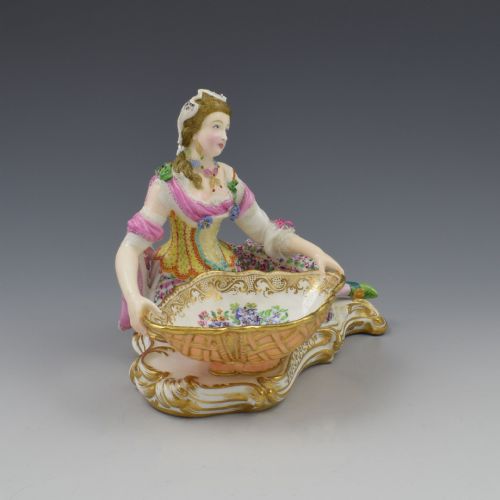fig 1. Minton Porcelain Figure With Lace Reclining Lady With Sweetmeat Basket Model 57