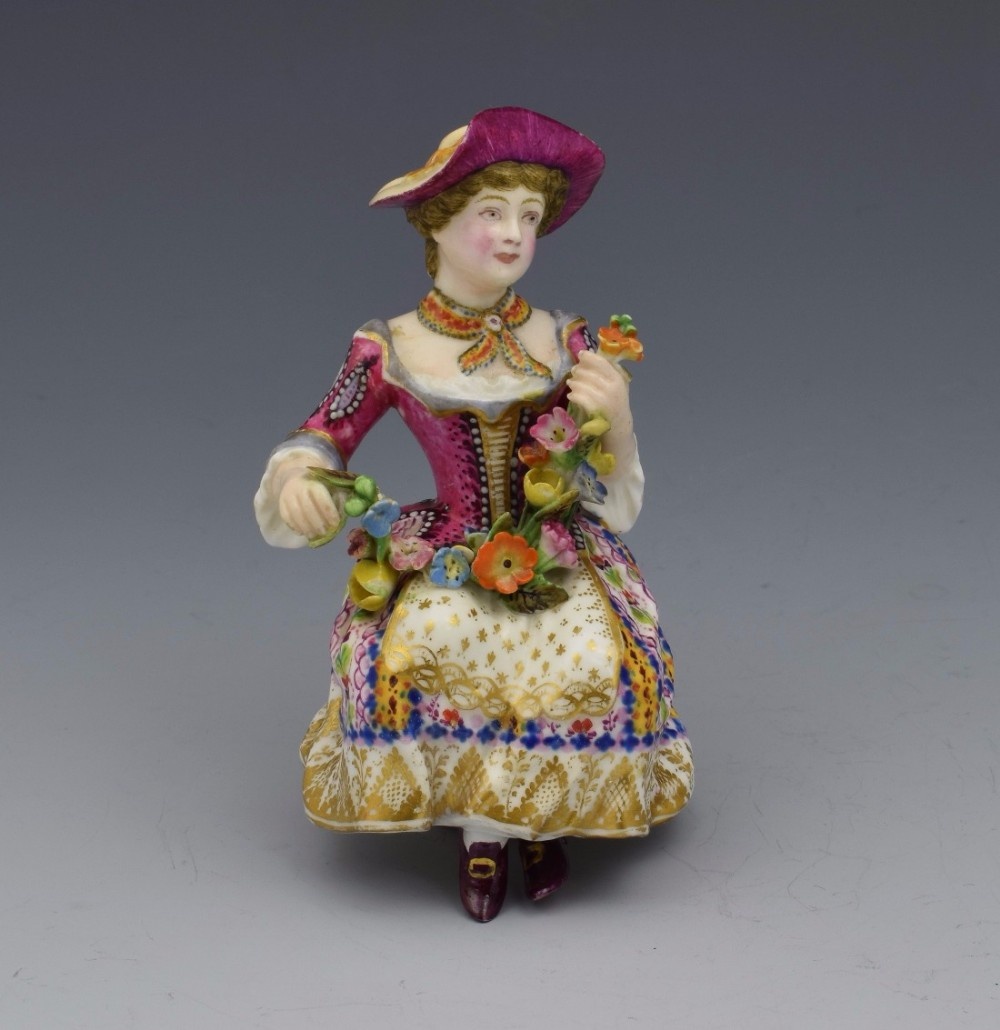 Rare Minton Candlestick Figure Seated Flower Seller, c.1830
