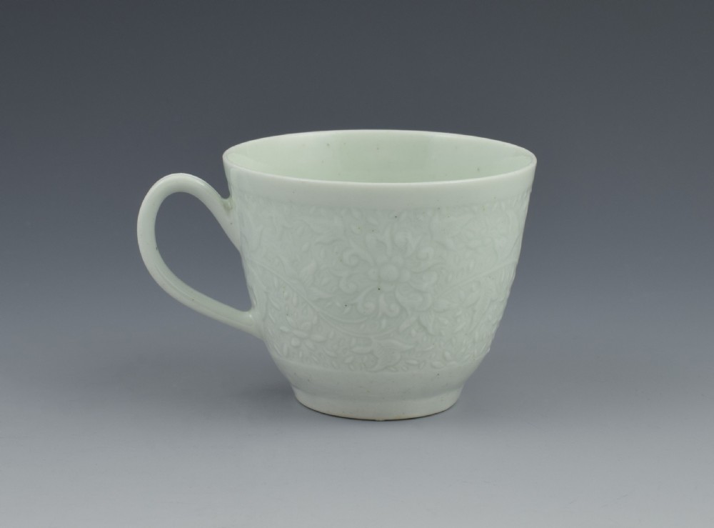 First Period Worcester White Glazed Chrysanthemum Relief Moulded Coffee Cup