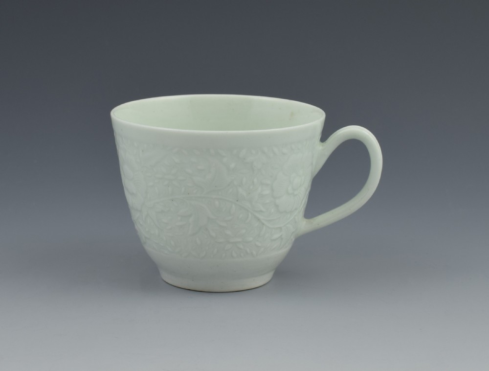 First Period Worcester White Glazed Chrysanthemum Relief Moulded Coffee Cup View V