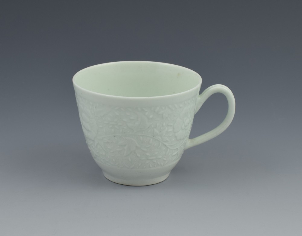 First Period Worcester White Glazed Chrysanthemum Relief Moulded Coffee Cup View X