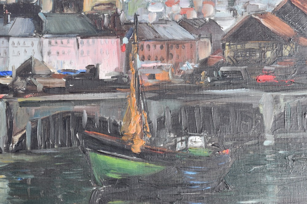 An impressionist oil painting depicting boats anchored in a French harbour against a backdrop of town buildings and a spire, set within an ornate carved frame. View IV