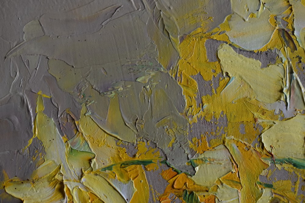 A Post-Impressionist oil painting depicting a vibrant floral still life in yellow, orange, and white tones, rendered with thick impasto technique in a light-coloured framed mount. View V