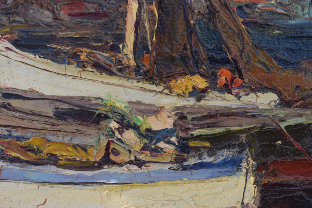A framed Post-Impressionist oil painting depicting moored fishing boats in a Mediterranean harbour, housed in a carved gilt frame with a cream inner border. View III