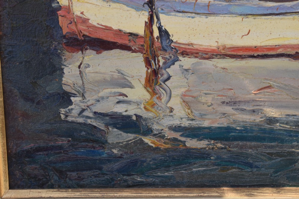 A framed Post-Impressionist oil painting depicting moored fishing boats in a Mediterranean harbour, housed in a carved gilt frame with a cream inner border. View VI