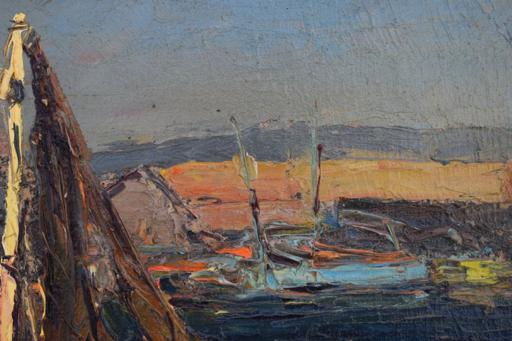 A framed Post-Impressionist oil painting depicting moored fishing boats in a Mediterranean harbour, housed in a carved gilt frame with a cream inner border. View VII