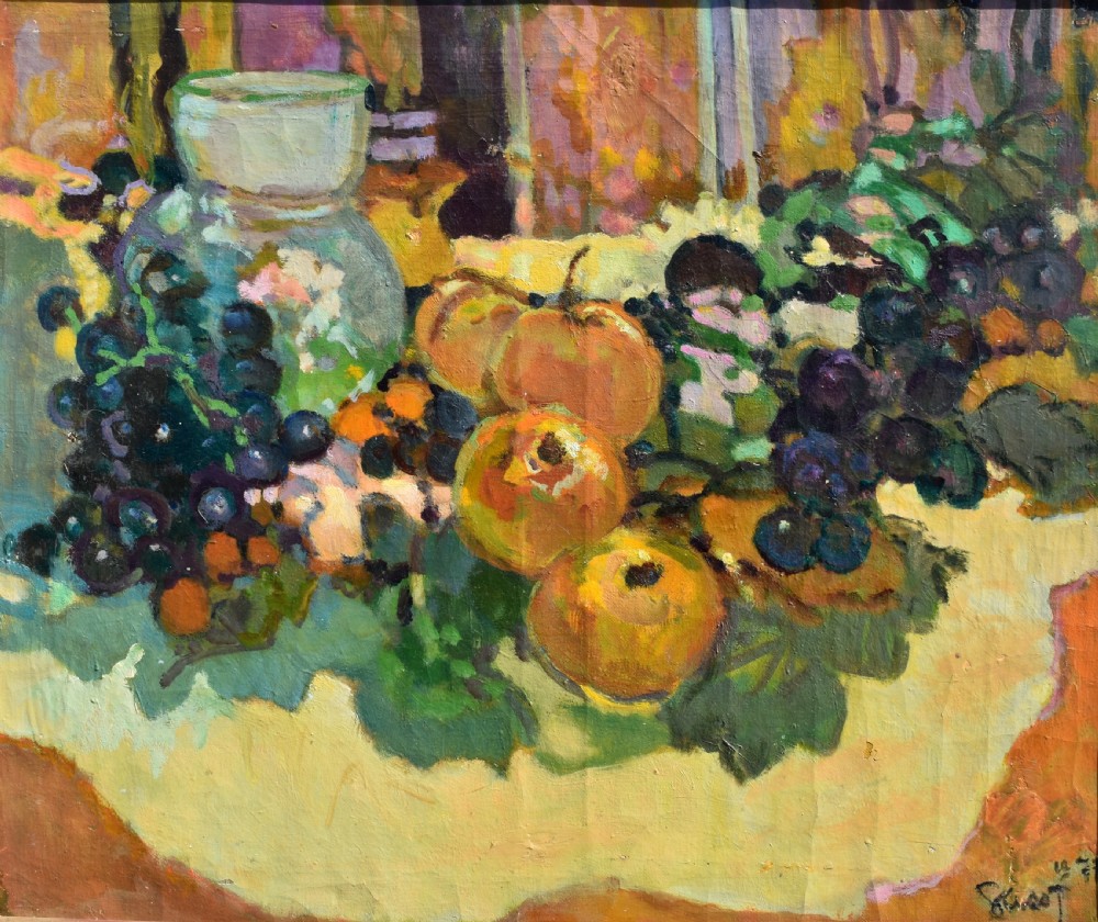 A framed post-impressionist still life oil painting depicting a glass jug, dark grapes, and yellow fruit on a draped surface. View II