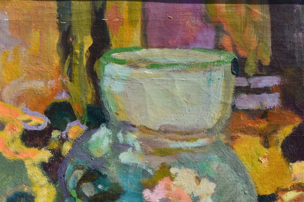 A framed post-impressionist still life oil painting depicting a glass jug, dark grapes, and yellow fruit on a draped surface. View III