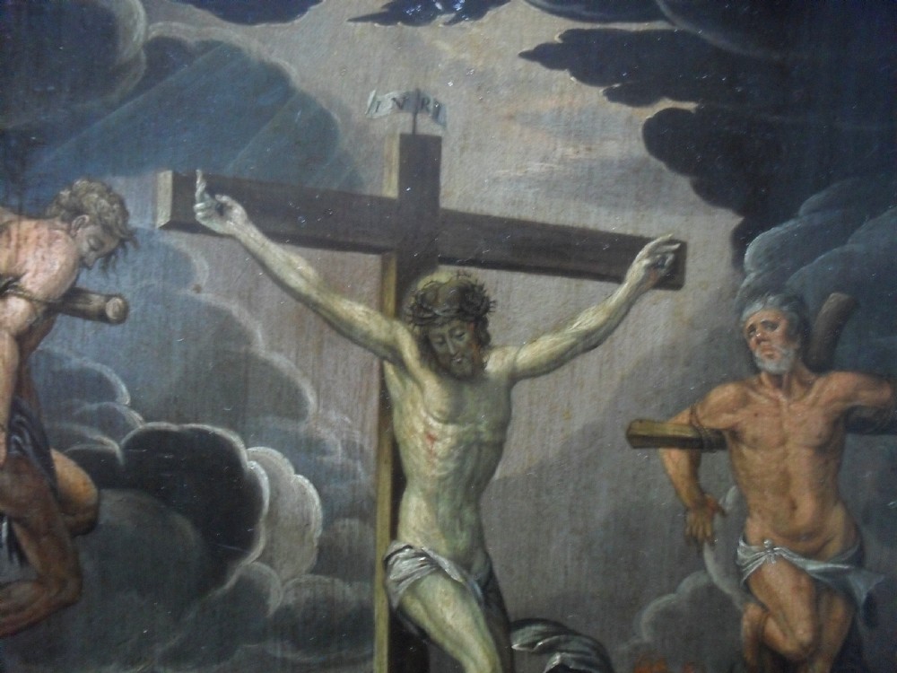 An 18th-century Netherlandish oil painting depicting the Crucifixion of Christ set within an ornate carved giltwood frame. View XI