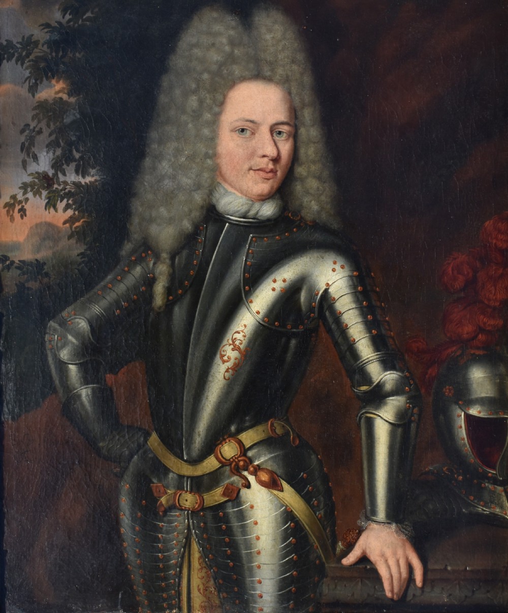 An 18th-century Baroque oil painting depicting a gentleman wearing full plate armour and a powdered wig, set within a heavily moulded giltwood frame. View II