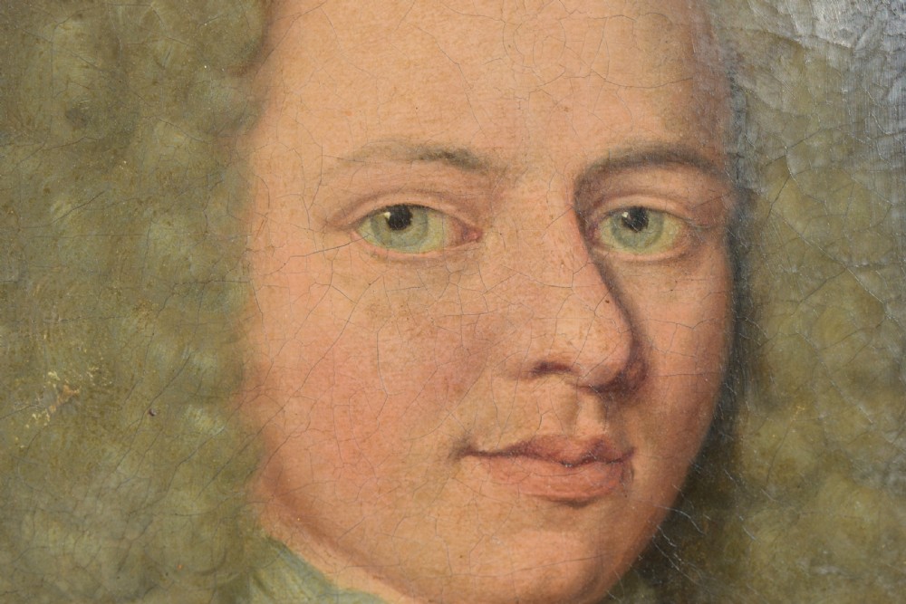 An 18th-century Baroque oil painting depicting a gentleman wearing full plate armour and a powdered wig, set within a heavily moulded giltwood frame. View VIII
