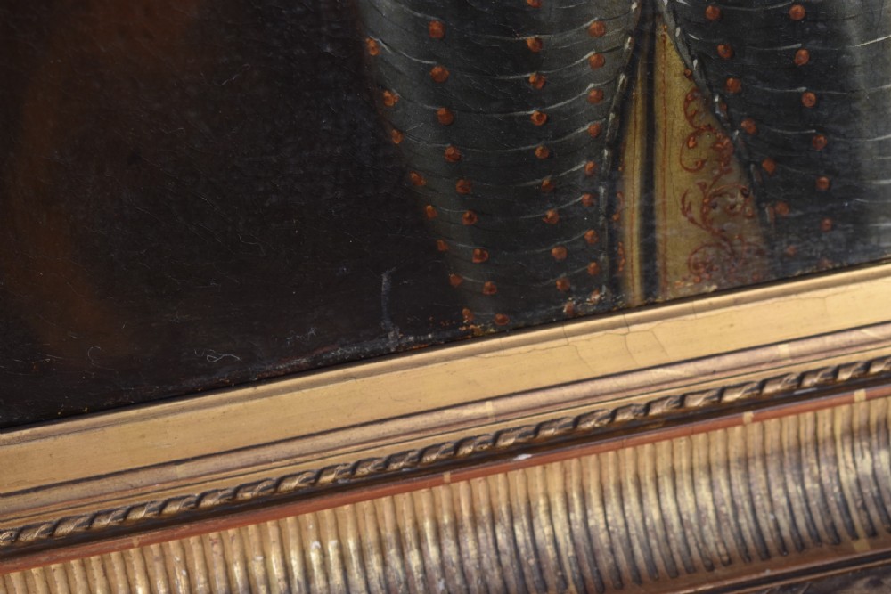 An 18th-century Baroque oil painting depicting a gentleman wearing full plate armour and a powdered wig, set within a heavily moulded giltwood frame. View XV
