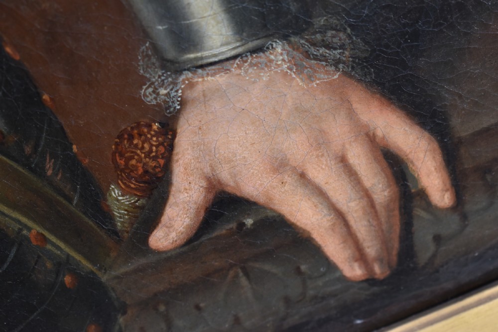 An 18th-century Baroque oil painting depicting a gentleman wearing full plate armour and a powdered wig, set within a heavily moulded giltwood frame. View XVII