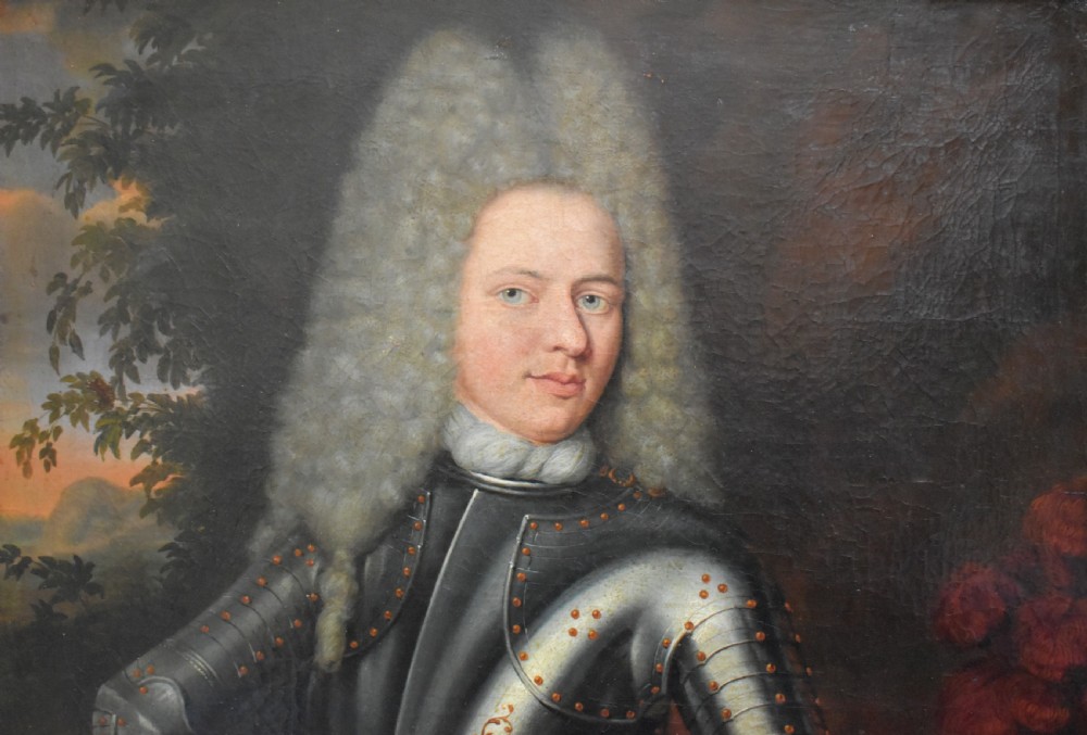 An 18th-century Baroque oil painting depicting a gentleman wearing full plate armour and a powdered wig, set within a heavily moulded giltwood frame. View XXI