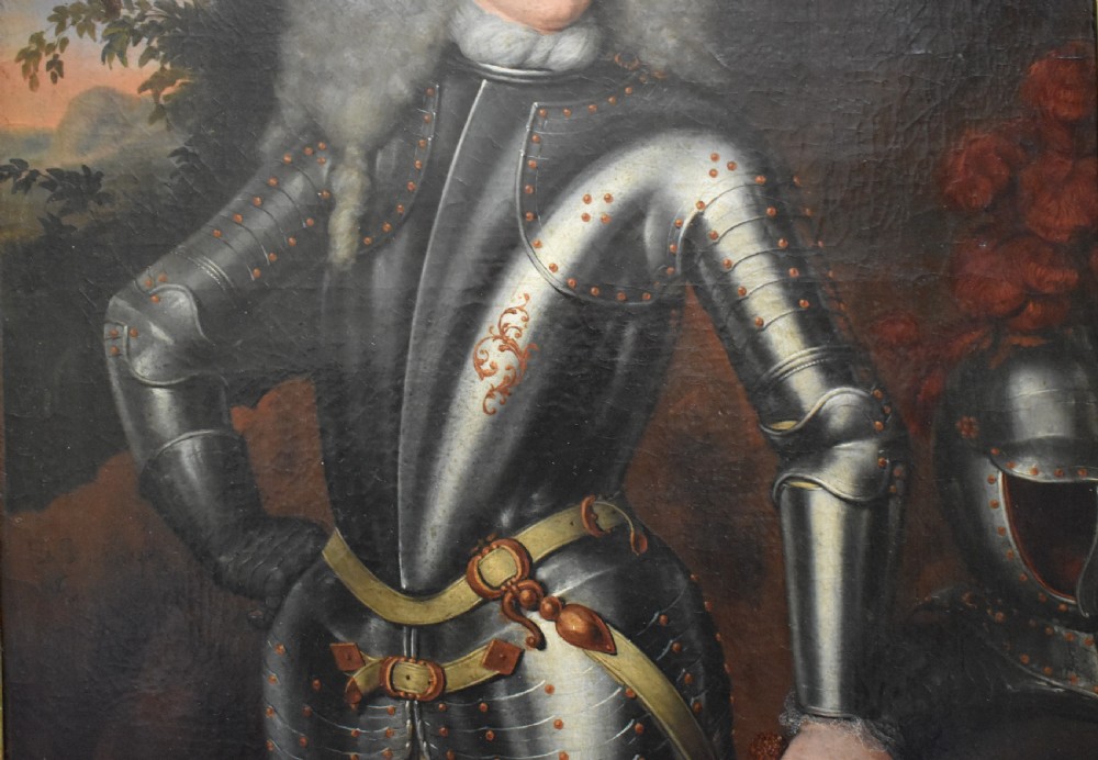 An 18th-century Baroque oil painting depicting a gentleman wearing full plate armour and a powdered wig, set within a heavily moulded giltwood frame. View XXII