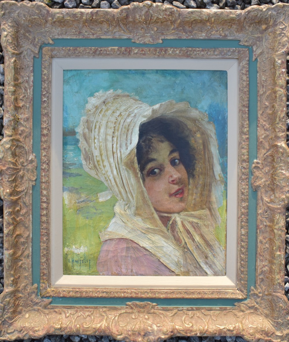 An antique oil painting depicting a woman wearing a white bonnet, framed in an ornate gilded frame with a teal slip.