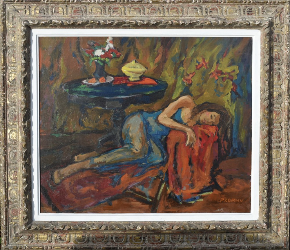 A framed French Post-Impressionist oil painting depicting a reclining woman in a blue dress inside a warm ochre and red interior.