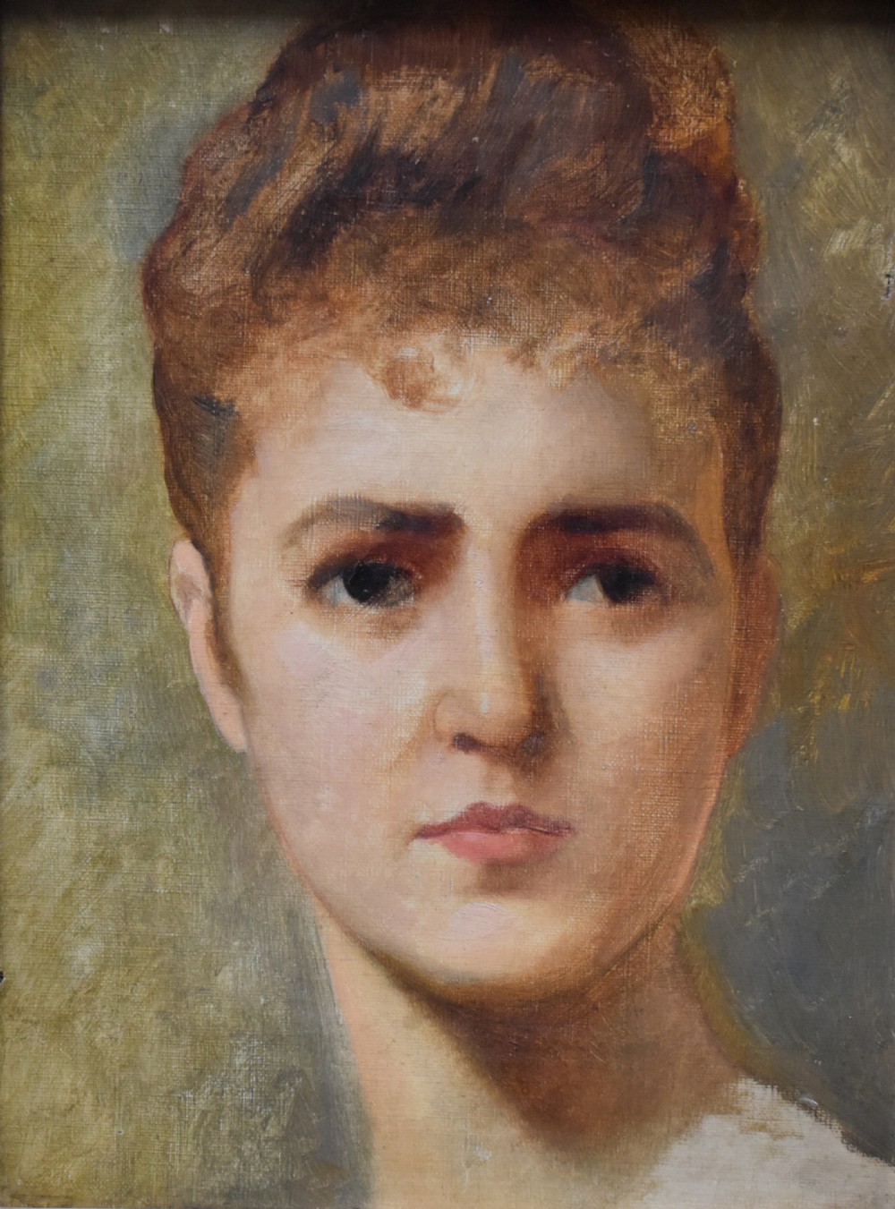 An antique 19th-century oil painting depicting the head-and-shoulders portrait of a woman with a high updo hairstyle against a neutral beige background.