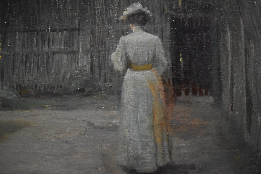 A 19th-century Danish school oil painting depicting a woman in a light dress standing in a garden setting, presented in a textured moulded frame. View III