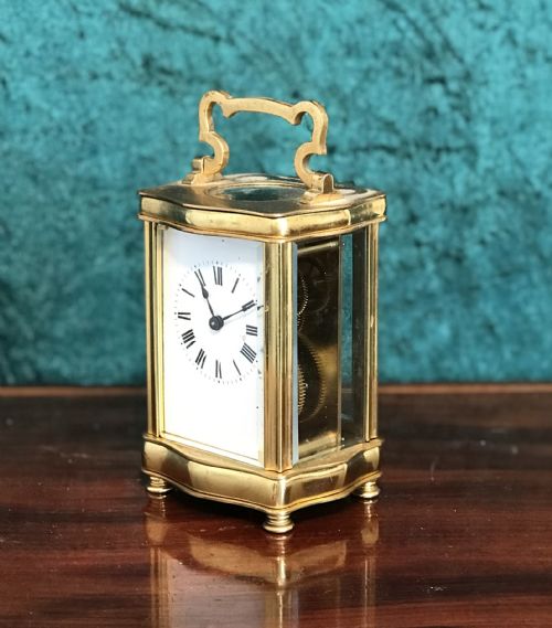 Eight day Serpentine cased carriage clock