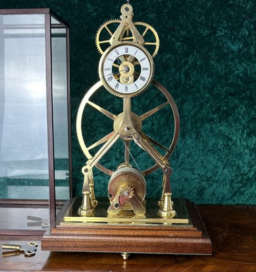 Great Wheel Skeleton Clock Complete with Dust Cover.
unique Mantle Clock