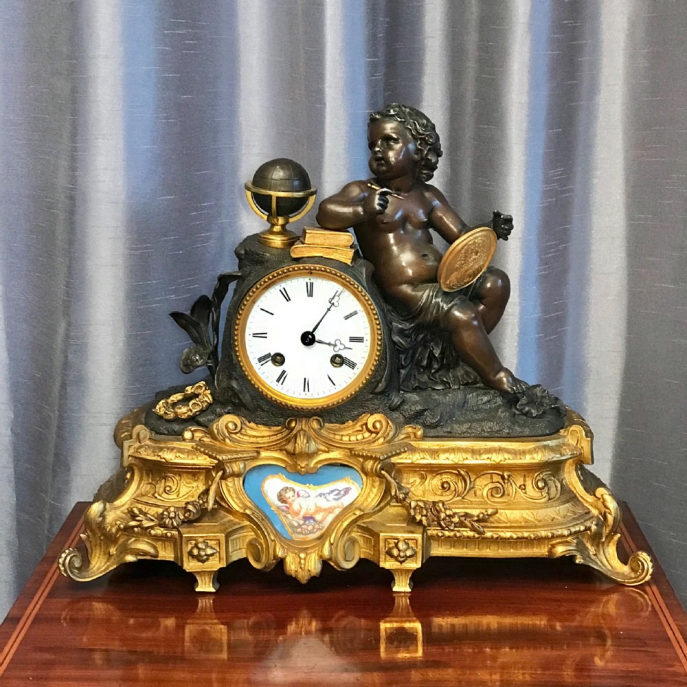 A Victorian eight day hour and a half hour striking mantle clock.