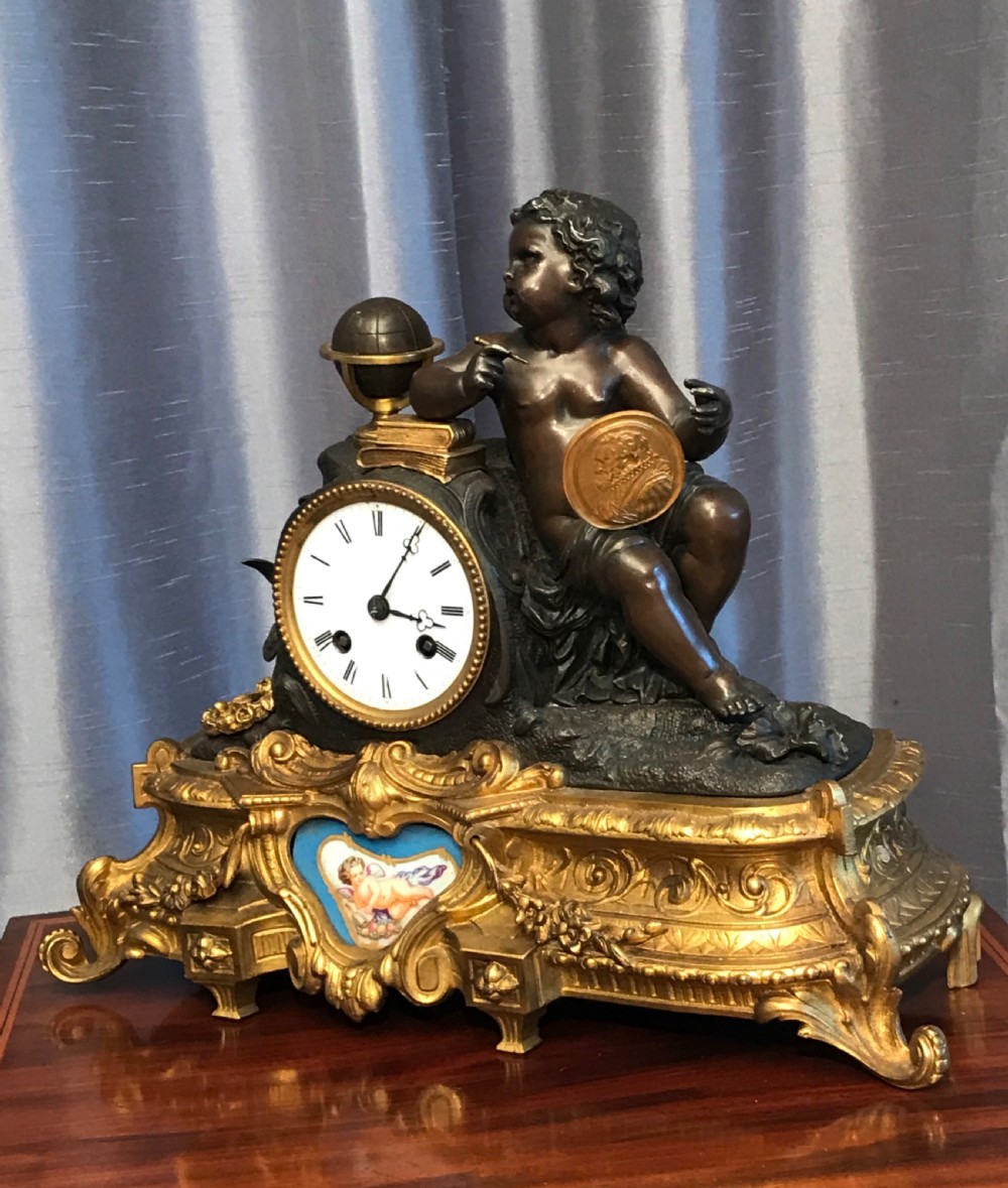 A Victorian eight day hour and a half hour striking mantle clock. View III