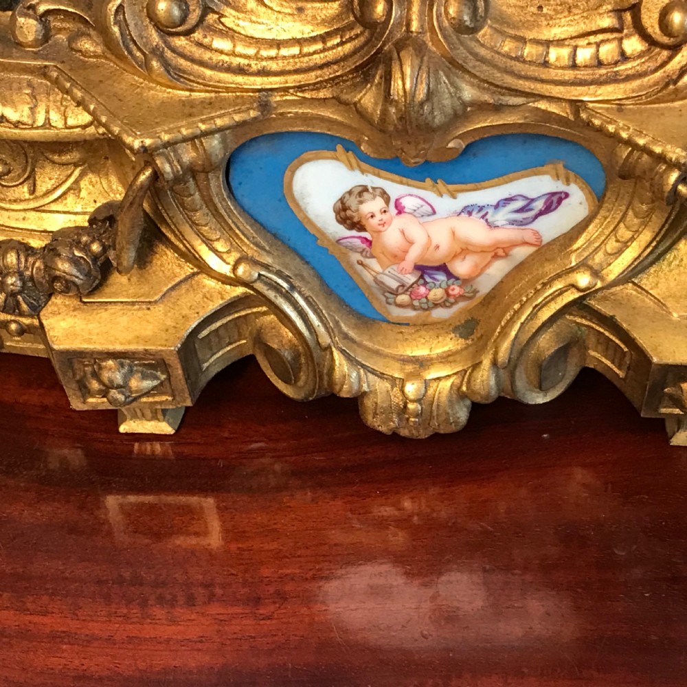 A Victorian eight day hour and a half hour striking mantle clock. View VII