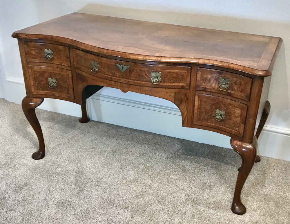  A fine walnut versatile writing, dressing table or sideboard, lowboy circa  1920