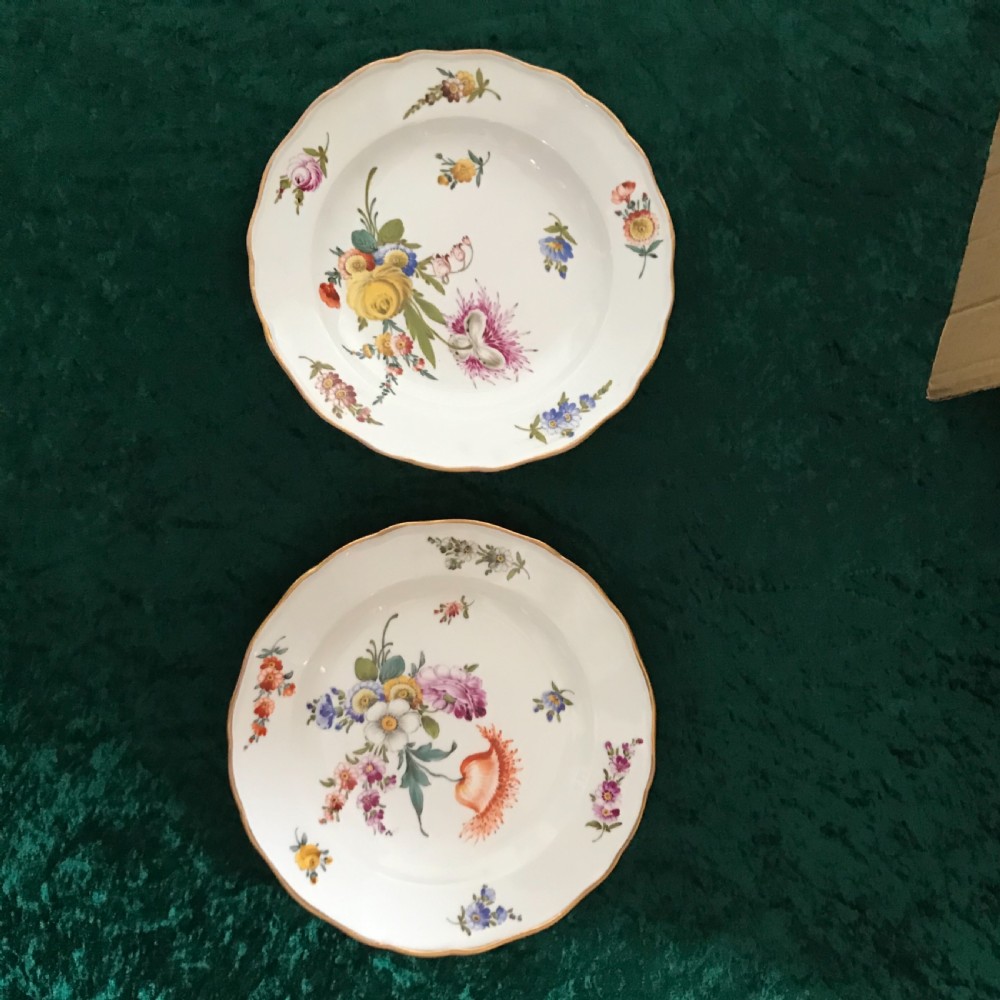 Exceptional condition pair of hand painted Meissen plates circa 1900