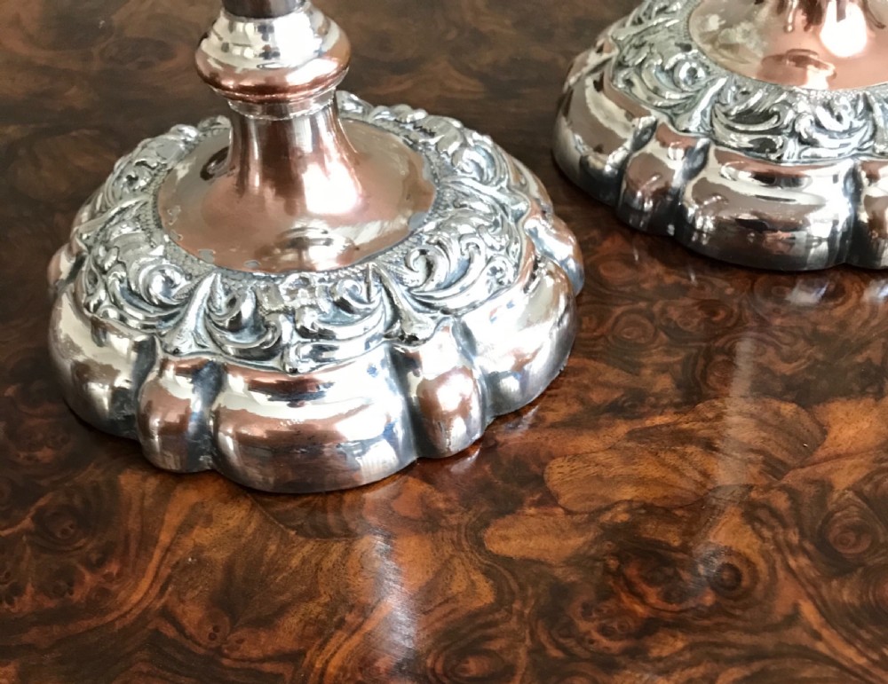 A pair of old Sheffield plated candlesticks circa 1920 View II