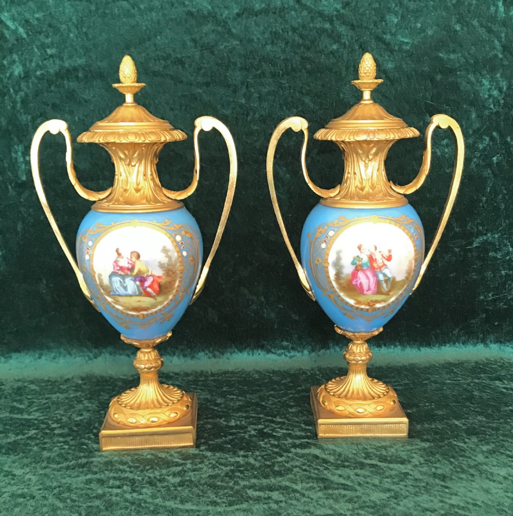 A most  decorative pair of vases in the manner of Sevres