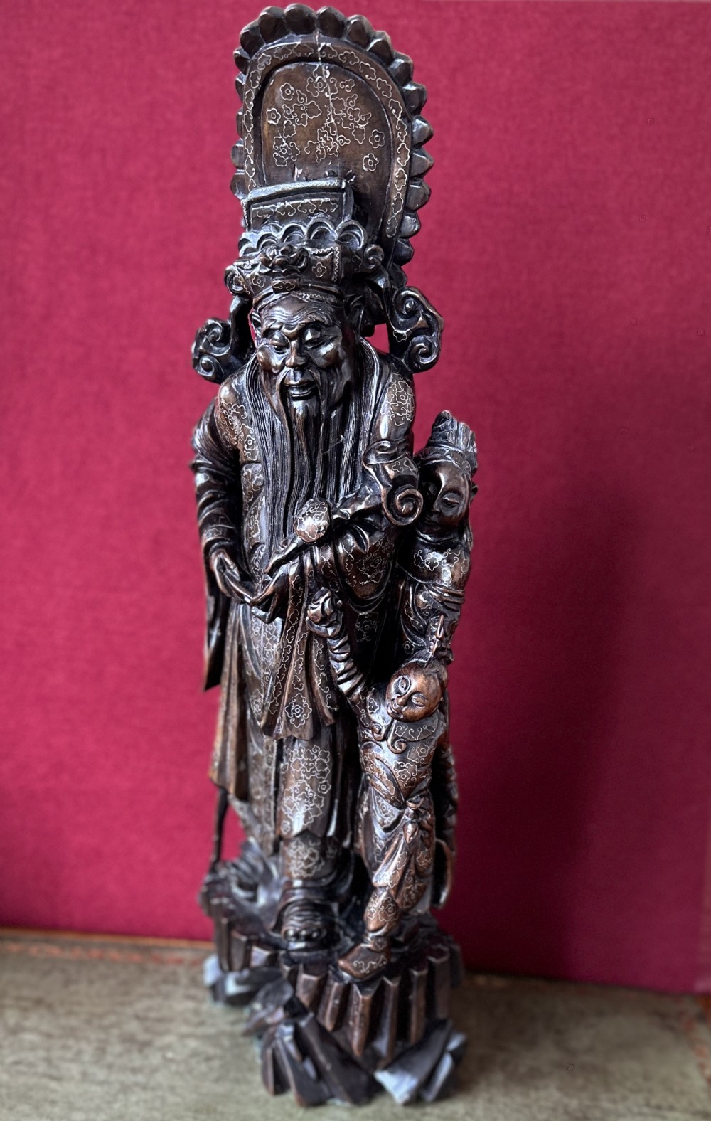 Chinese figure of a dignitary, circa 1880