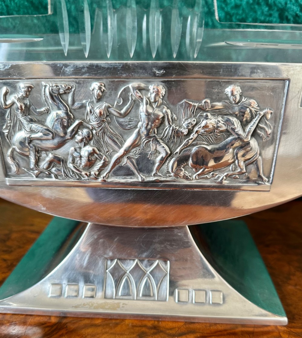 An Art Deco silver-plated boat-shaped tazza with a central classical relief panel and a fitted cut glass liner. View III