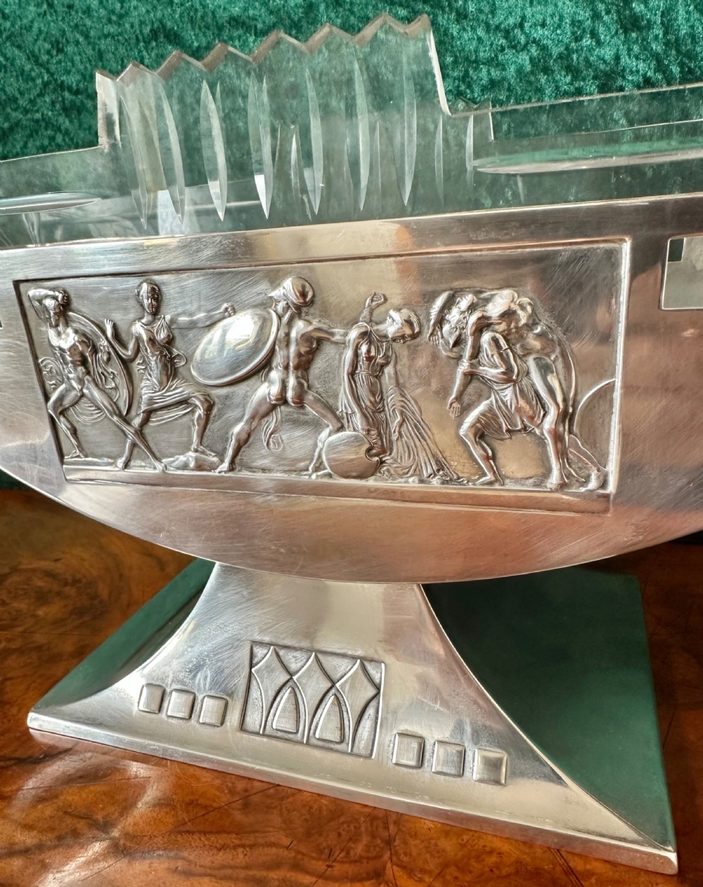 An Art Deco silver-plated boat-shaped tazza with a central classical relief panel and a fitted cut glass liner. View XI
