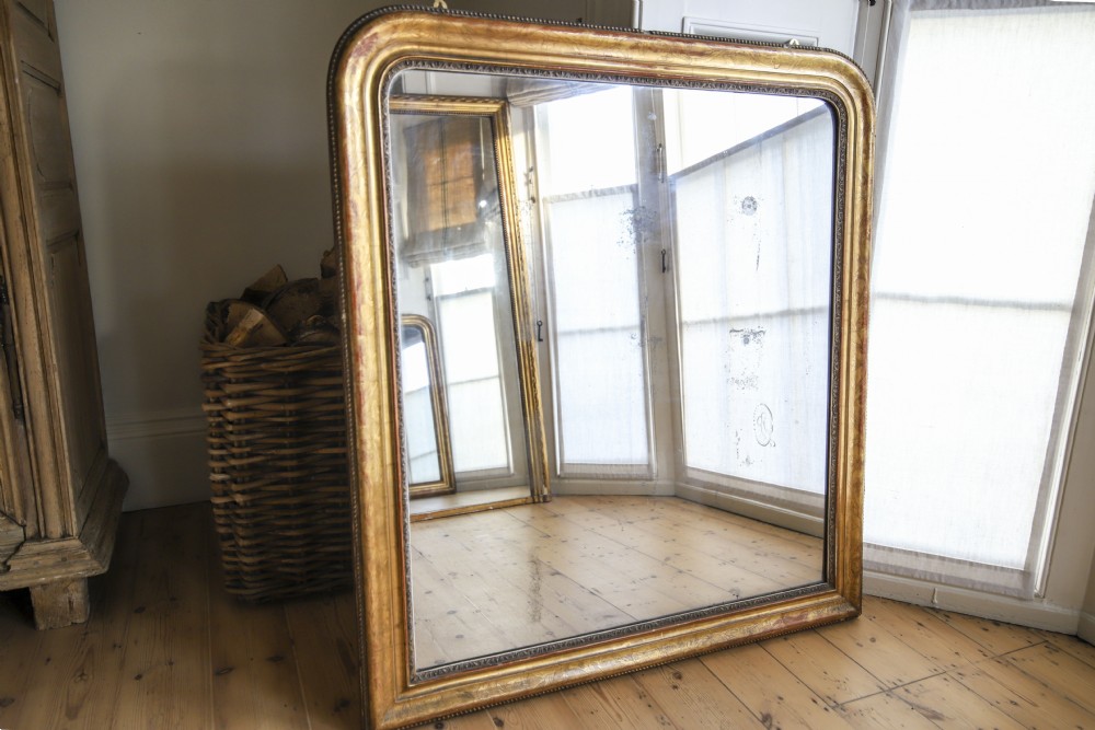 Wide 19th century French Louis Philippe gilt mirror - mercury glass