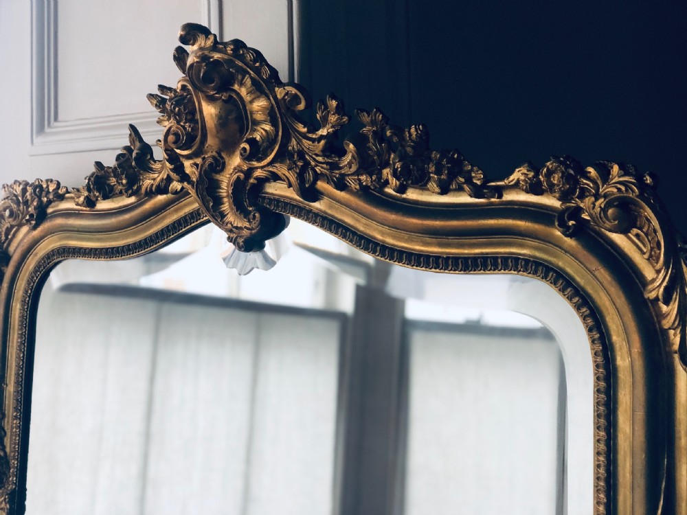 Antique French Louis XV crested gilt leaner mirror View II