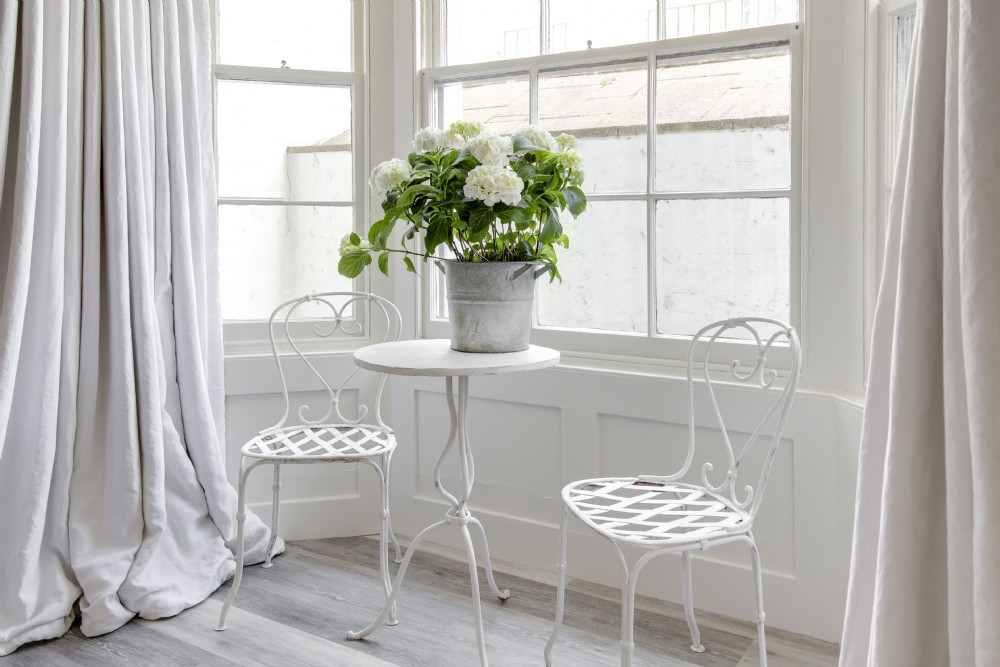 Antique French painted iron garden table and chairs