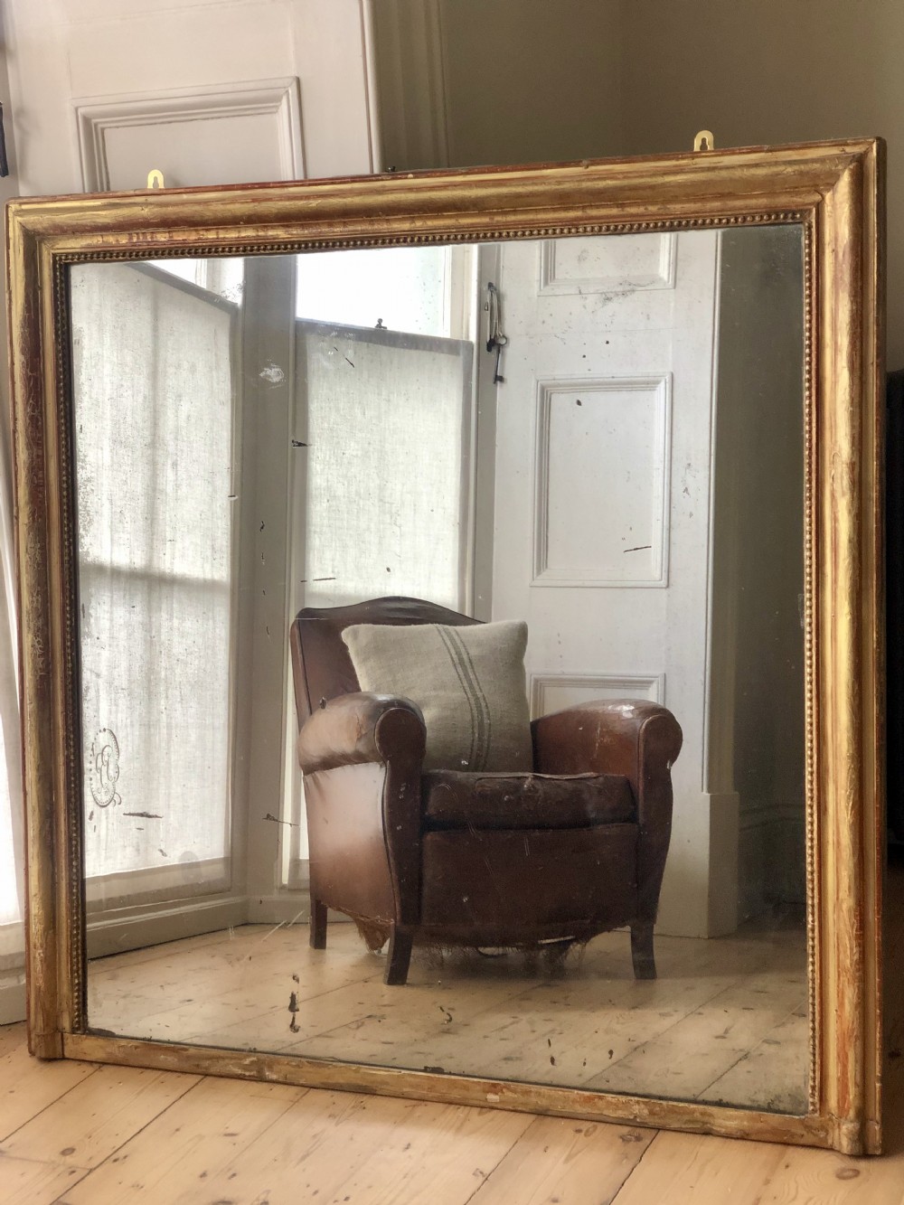 Large 19th century French antique gilt overmantel bistro mirror