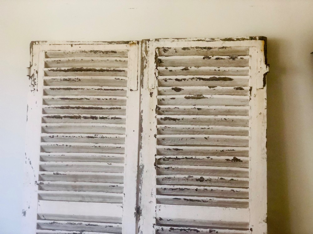 Antique French oak painted shutters View II