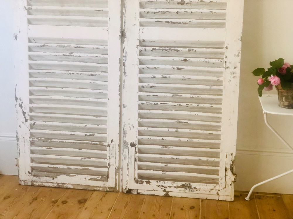 Antique French oak painted shutters View III