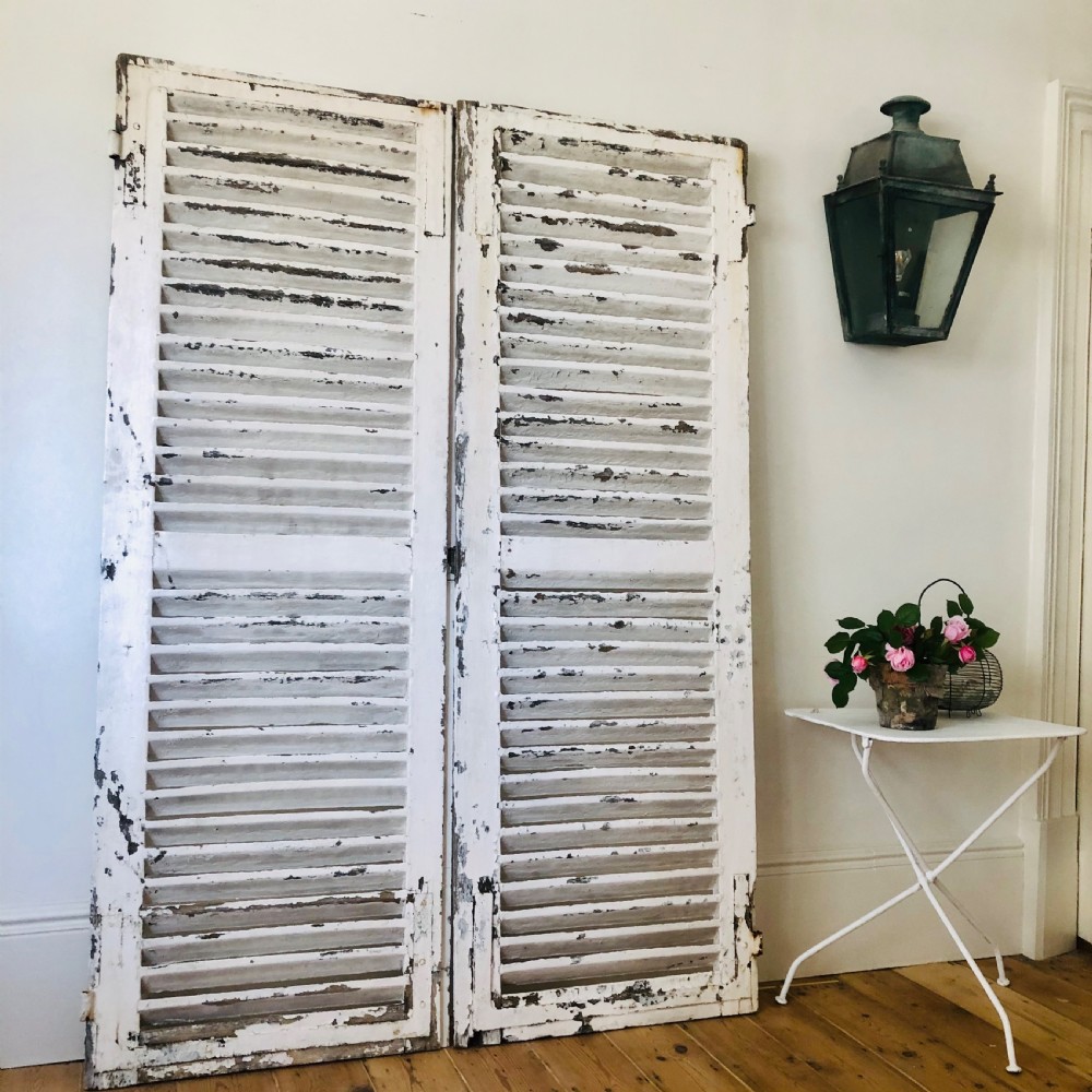 Antique French oak painted shutters View V