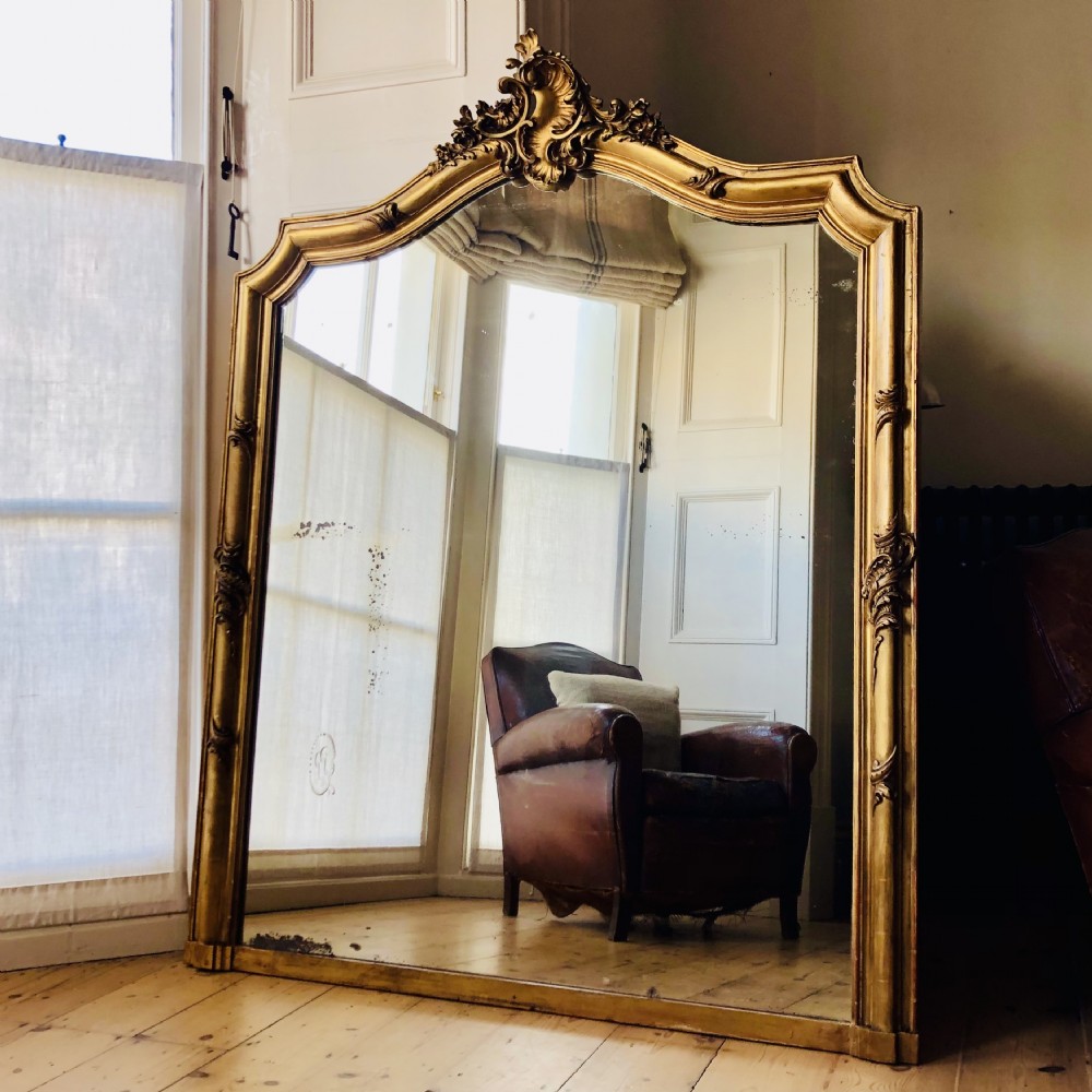 Large antique French gilt crested mirror 
