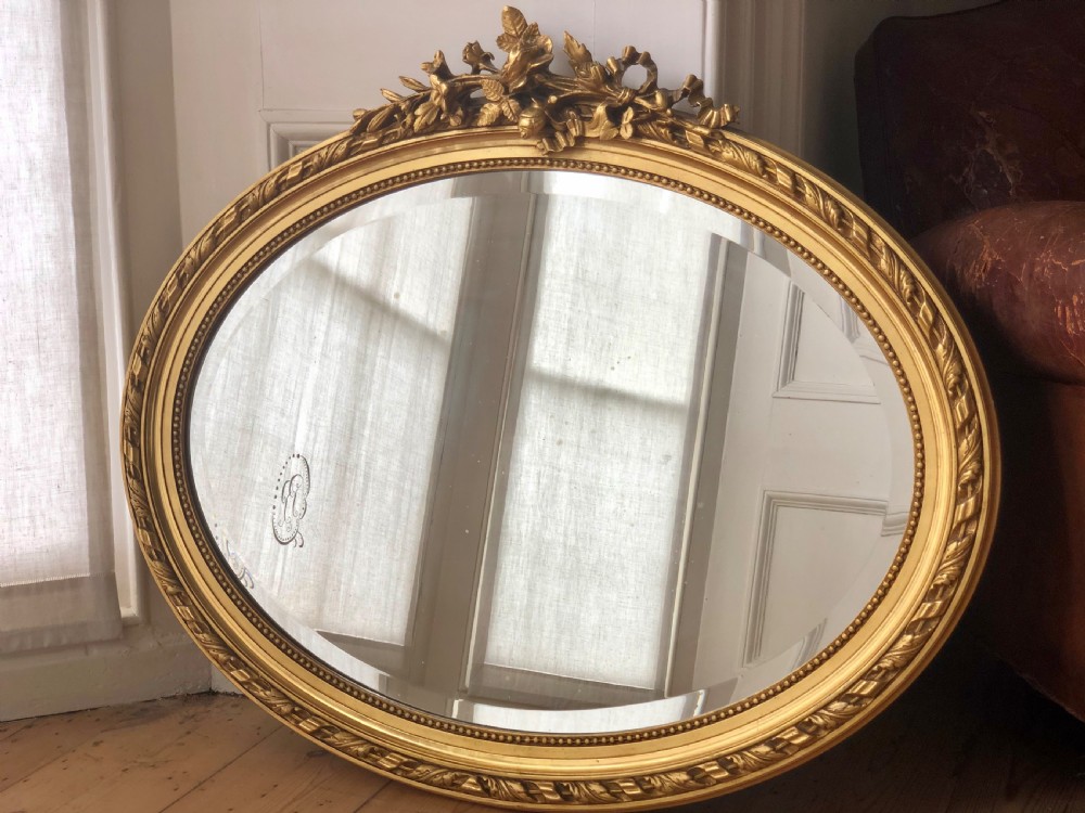 Antique French gilt oval mirror