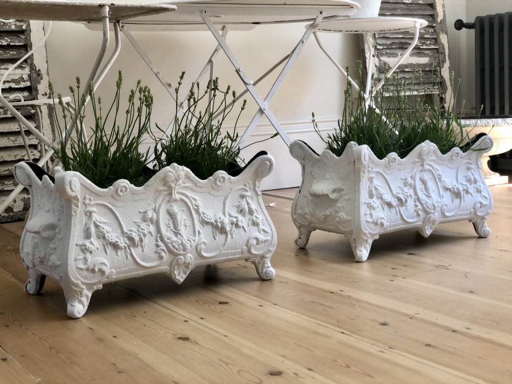 Pair of antique French cast iron planters