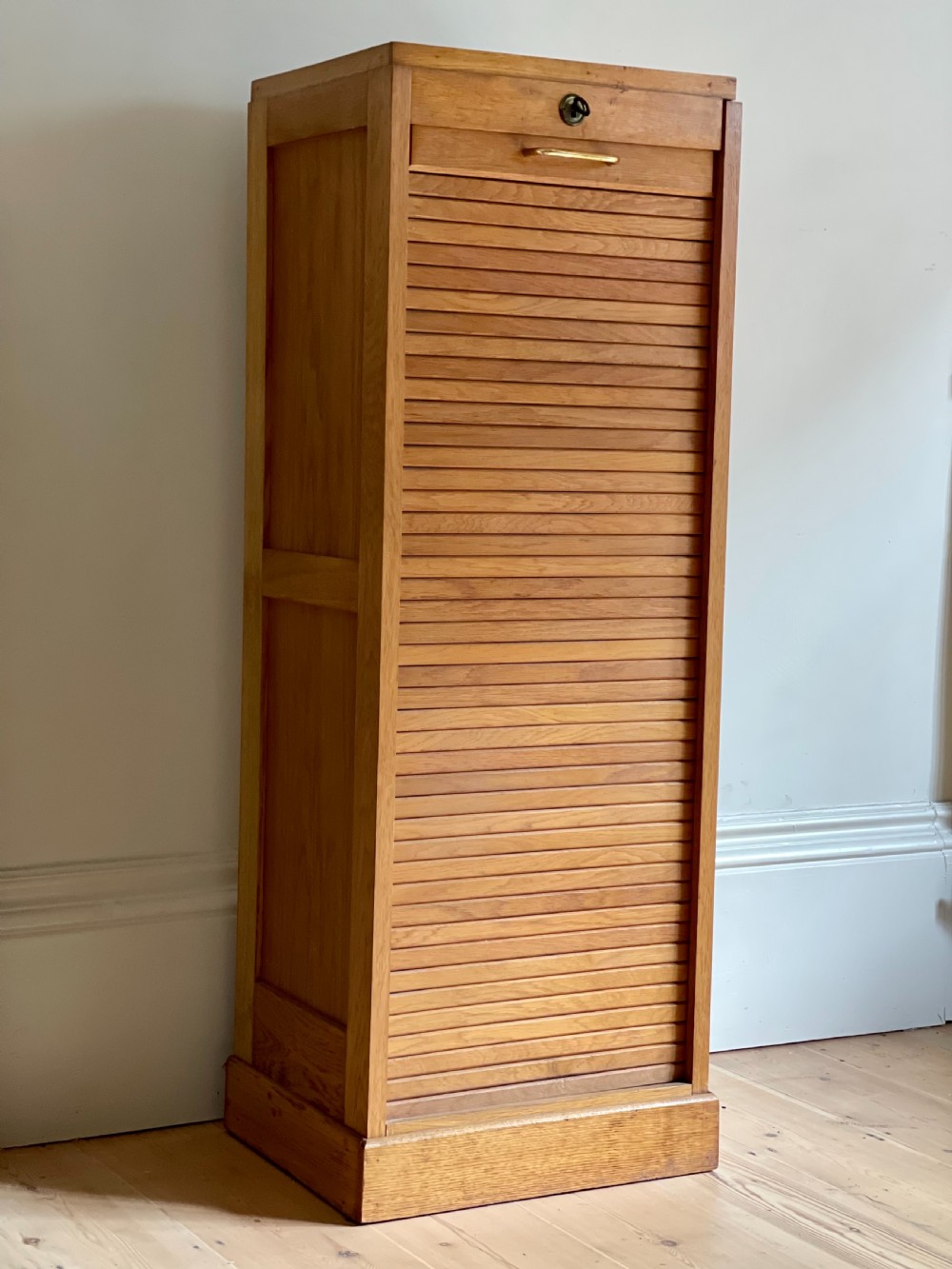 French oak tambour cabinet
