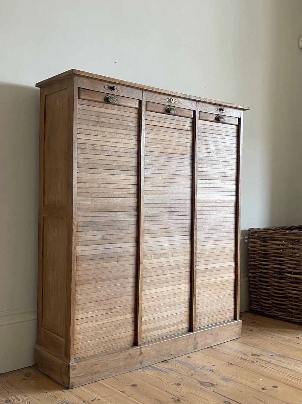 Antique French oak triple tambour cabinet 
